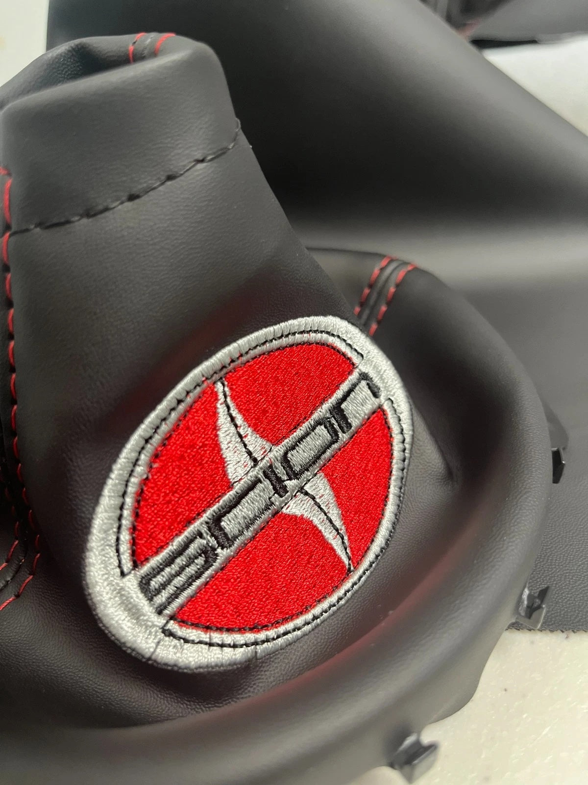 Manual transmission shift and e-brake boot cover set compatible with Scion FR-S featuring custom embroidery, premium interior upgrade, handcrafted replacement covers
